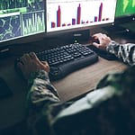 Photo of a service member performing DoD data management