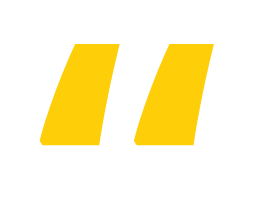 Blocky, yellow quotation marks.